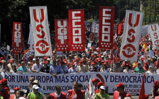 Spaniards march against government austerity