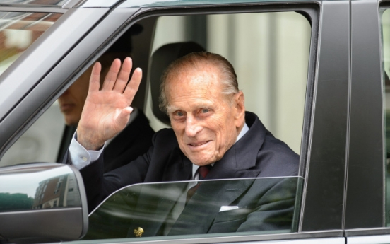 Britain’s Prince Philip leaves hospital after surgery