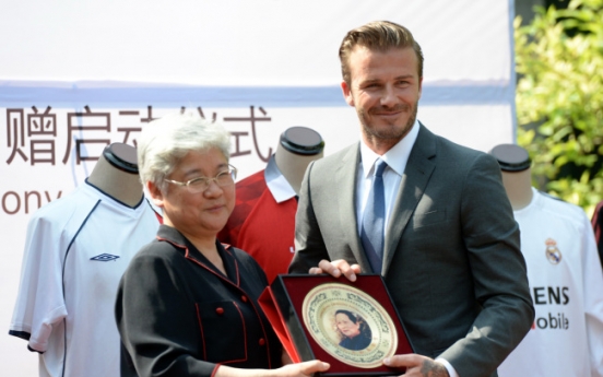 Beckham shines during China visit