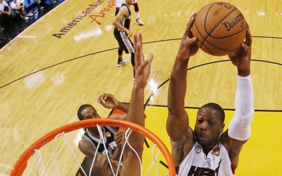 Heat beats Spurs in OT, forcing Game 7