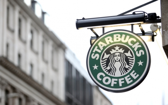 Starbucks says pays British corporation tax after row