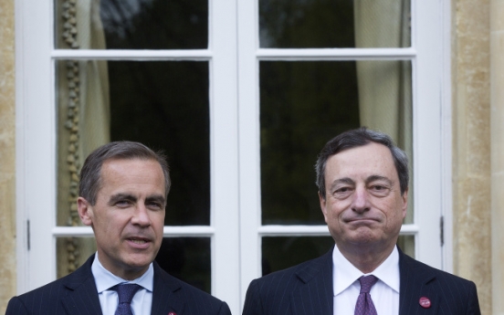 ECB, BOE soothe markets in rate pledge