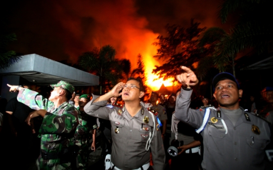 Inmates riot, escape, set fire to Indonesia prison