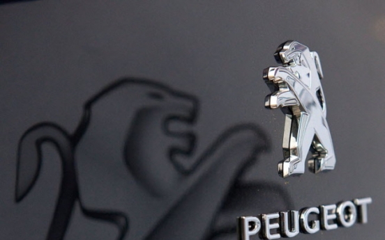 EU clears Peugeot restructuring plan