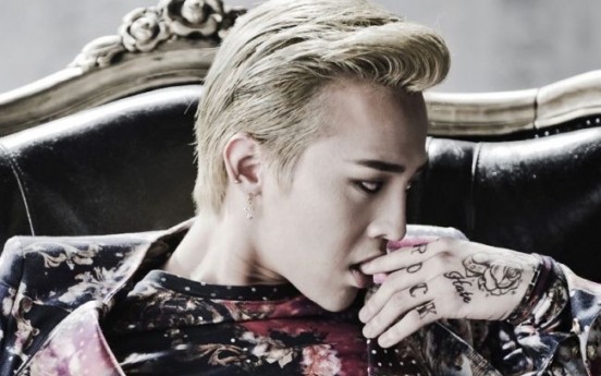 G-Dragon donates 80m won to charity