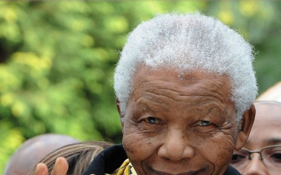 Mandela discharged from hospital, returns home