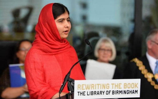 Malala says books can defeat terrorism at U.K. library opening