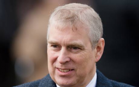 Prince Andrew challenged by police in palace gardens