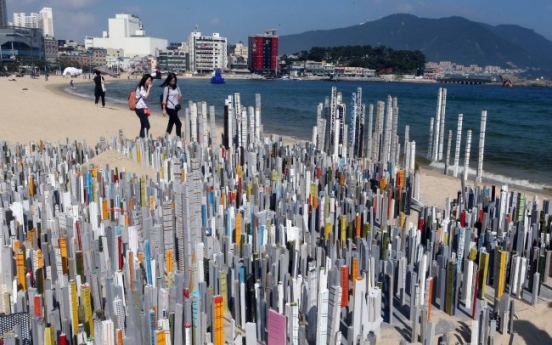 Sculptures replace holiday sunseekers on Busan beach