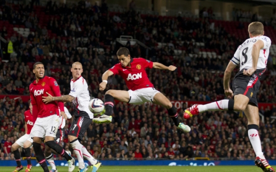 United spoils Suarez’s Liverpool return