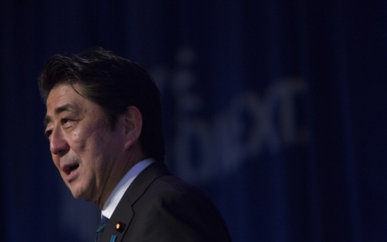 Abe bets it’s different this time with first tax rise since 1997 recession