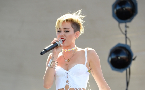 From Kanye to Pharrell, rap stars embrace Cyrus