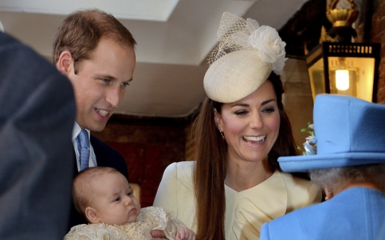 Chubby Prince George shown off at royal christening