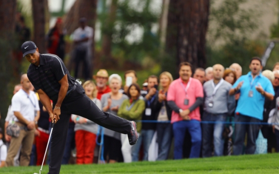 Woods at 1 under in rainy Turkey