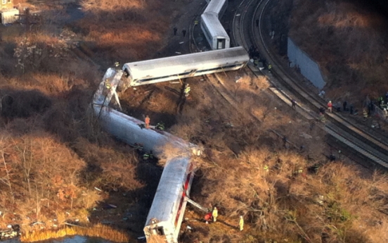 NYC train derailment kills 4, hurts more than 60