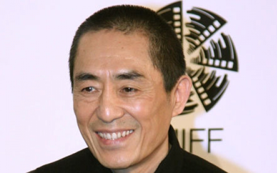 Star Chinese director admits defying one-child rule