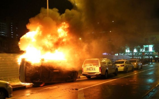 18 hurt after Singapore's worst rioting in decades