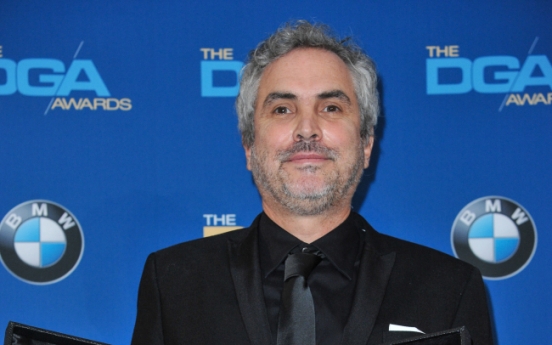 Cuaron wins DGA for ‘Gravity,’ gains Oscar edge