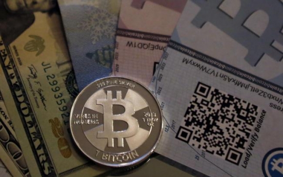 Bitcoin dealers charged with money laundering