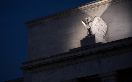 Despite market unrest, Fed likely to pare stimulus