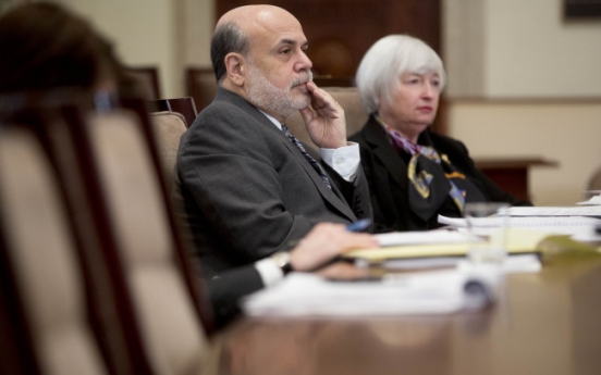 Yellen sworn in as Bernanke joins Brookings