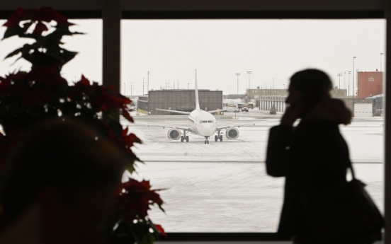 Cellphone calls on planes? Don’t ask the feds