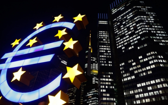 Draghi says ECB may add to stimulus if deflation risks rise