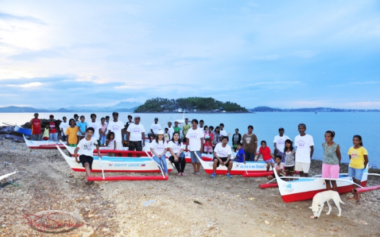 Filipinos in Korea help Haiyan survivors float