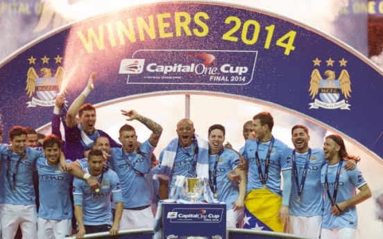 Man City wins League Cup title