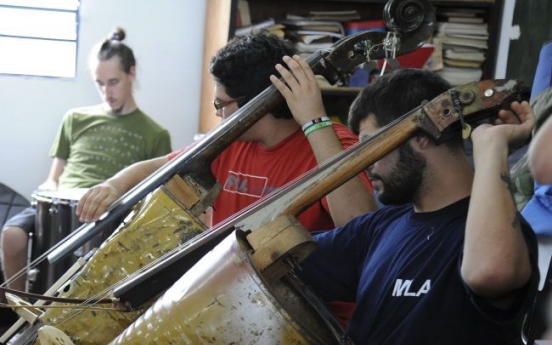 Paraguay group of poor kids turns garbage into sweet melodies