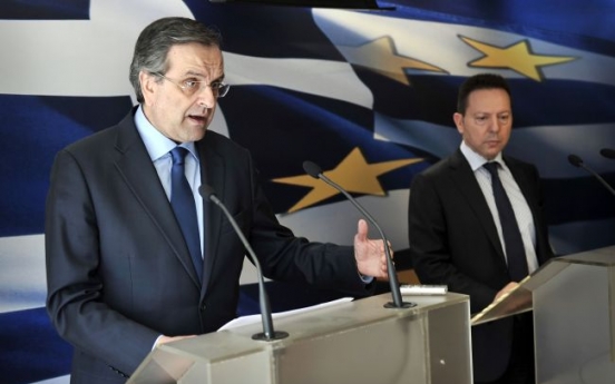 Greece reaches troika deal