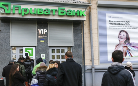 Russia closes 4 Ukrainian banks in Crimea amid integration push