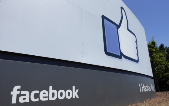 Facebook profits triple as mobile soars