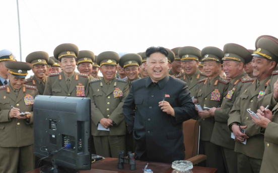 N. Korea's Kim leads key military meet, artillery drill