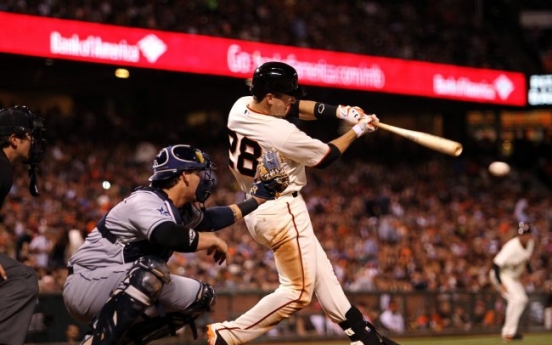 Hudson leads Giants past Padres 3-2