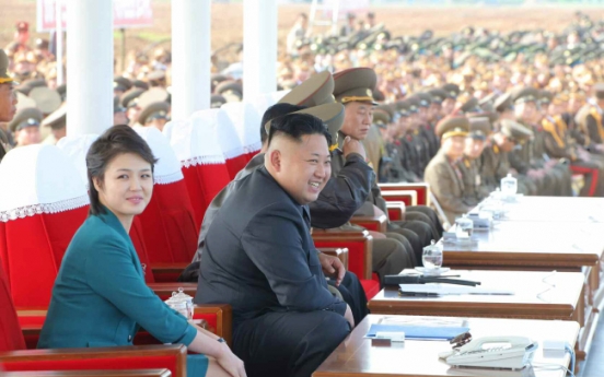 North Korean leader, wife attend air force test event