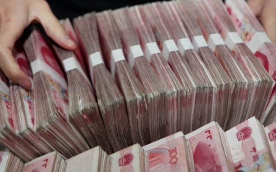 U.S. presses China to ease exchange rate controls