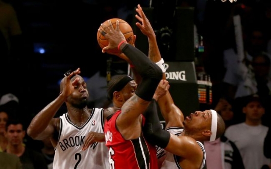 LeBron scores 49 as Heat beat Nets