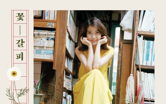 IU sweeps charts with covers album