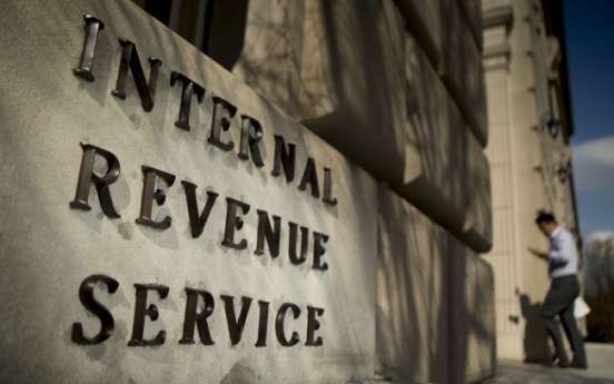 77,000 banks to share tax info with IRS