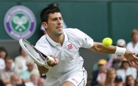 Djokovic survives