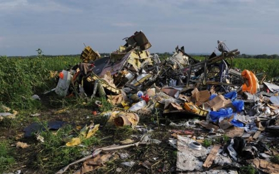 France, U.K. trade hypocrisy claims over MH17 sanctions, analysts say