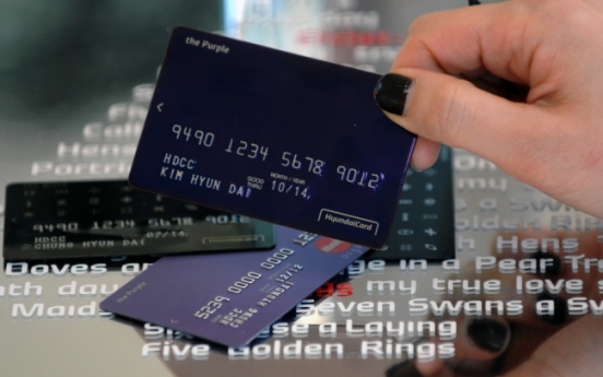 Credit card firms brace for debit card campaign