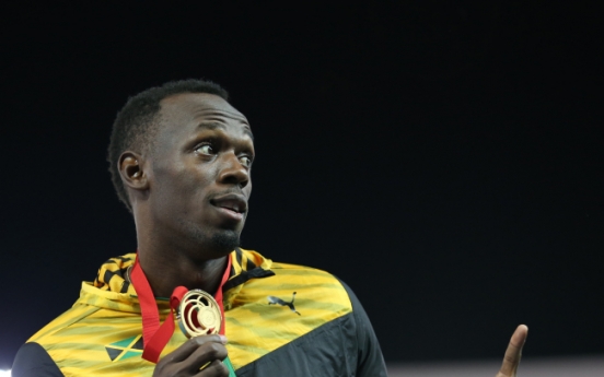 Usain Bolt strikes gold in Glasgow