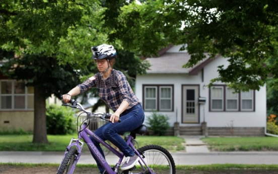 Look, man, no hands! Learning to ride a bicycle as an adult