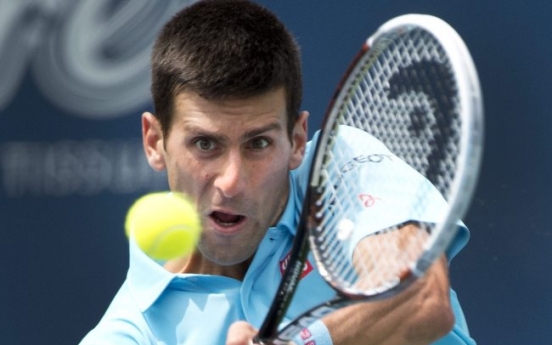 Djokovic, Murray advance in Toronto