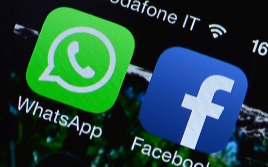 Facebook closes big-ticket buy of WhatsApp