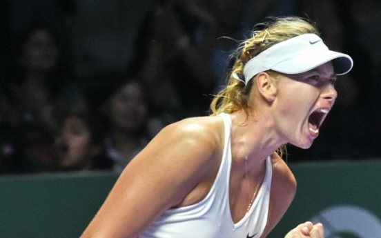 Wozniacki beats Sharapova at WTA Finals