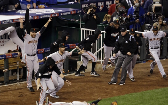 Giants hold off Royals to win World Series