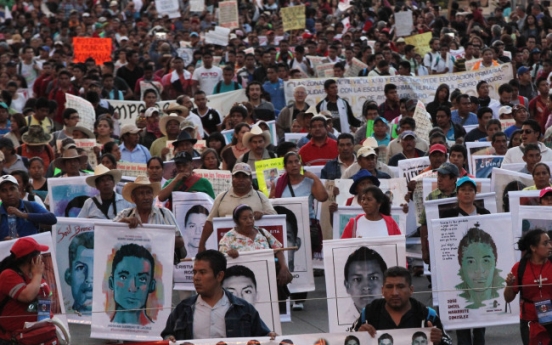 (Photo News) March for missing students